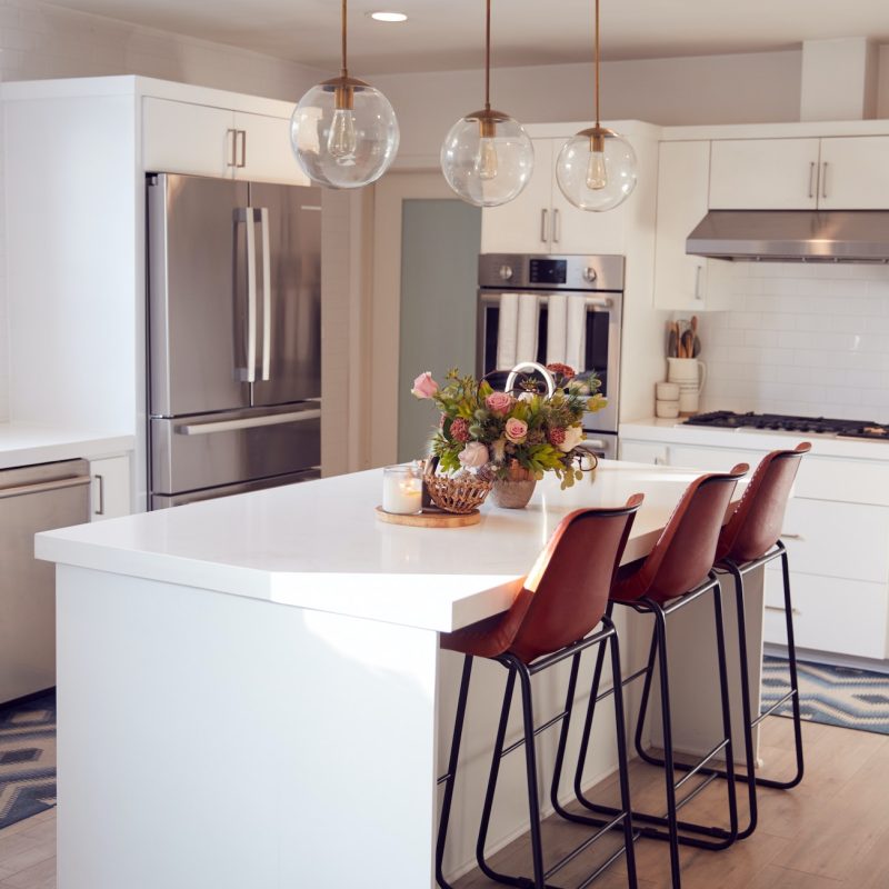 interior-view-of-beautiful-kitchen-with-island-counter-in-new-family-house.jpg